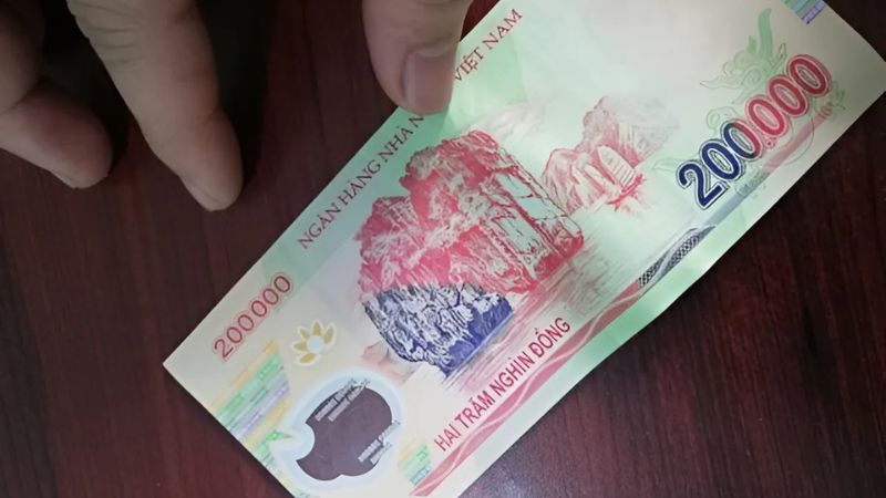 Điềm báo mơ thấy tiền 200 nghìn mình nhặt được